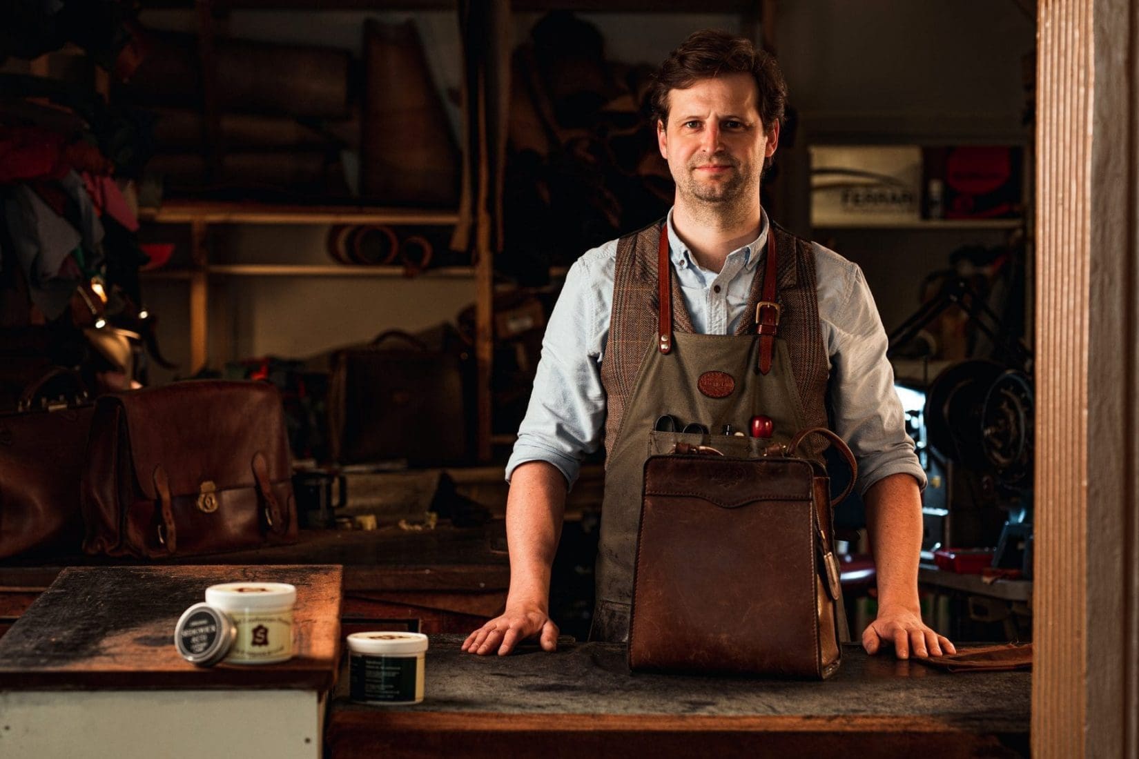 Master Craftsman, Simon, in the Mackenzie Leather Edinburgh traditional workshop