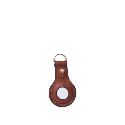 Leather Apple AirTag Holder in Italian soft hide matt brown colour, handmade by Mackenzie Leather Edinburgh.