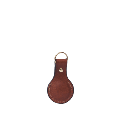 Leather Apple AirTag Holder in Italian soft hide matt brown colour, handmade by Mackenzie Leather Edinburgh.